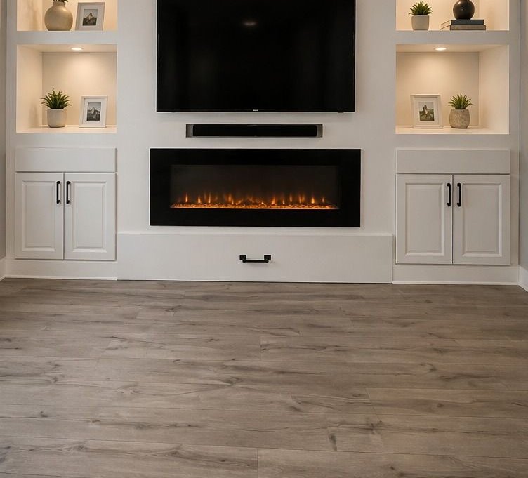 A finished built-in media wall with white cabinetry and an electric fireplace in a San Diego living room